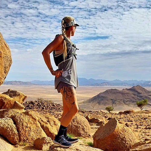 Runner on a mountain top, Namibia