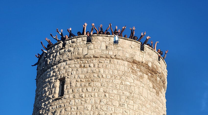 Okaukuejo, Etosha, Namibians waving from tower 