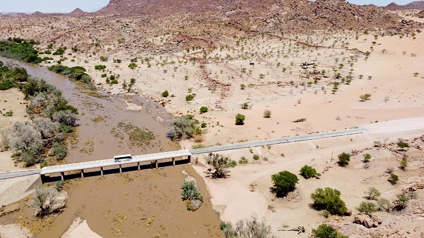 Ugab River flowing, bridge, eagles view, Namibia