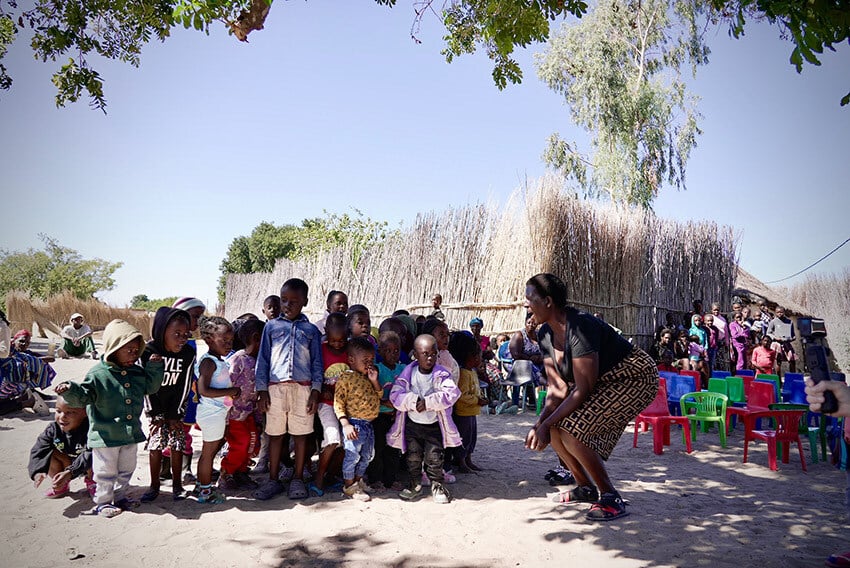 Children and teacher in Kalundu Kindergarten, Zambezi Region, Namibia web
