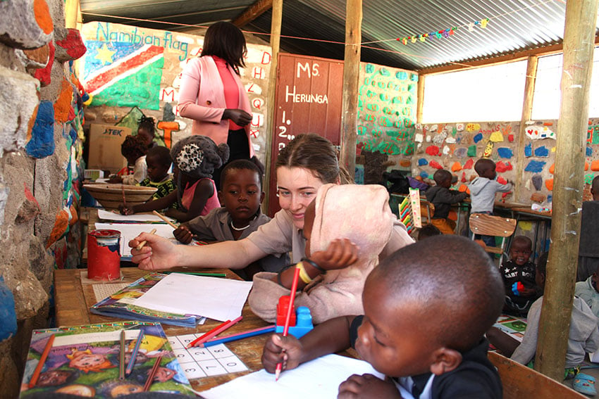 Namibian children in kindergarden, drawing pictures