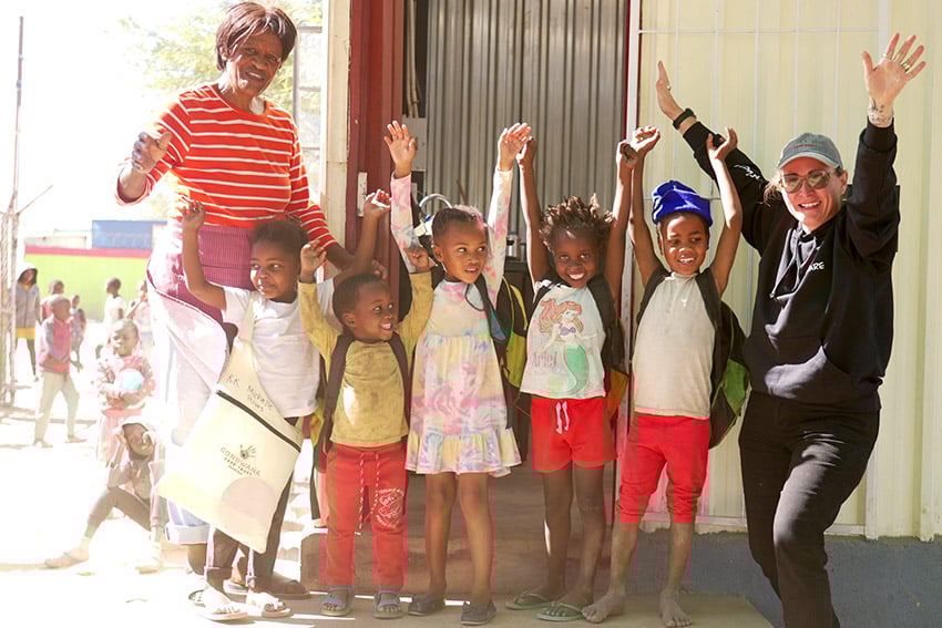Namibian adults and children cheering