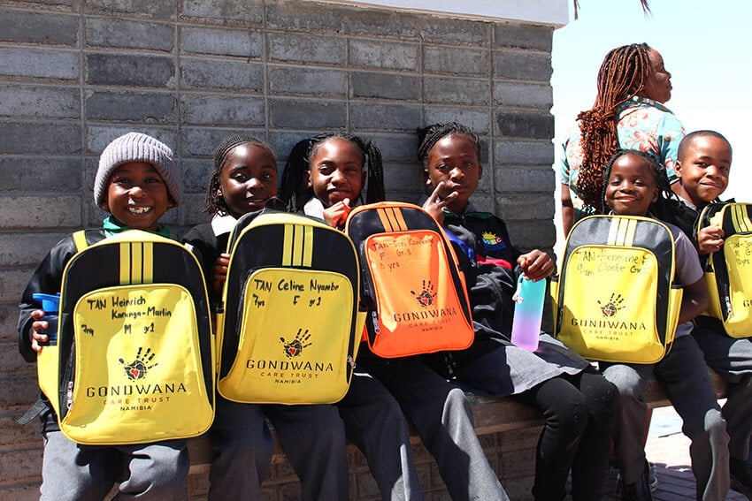 Tangeni Shilongo Centre, Swakopmund, children with Gondwana branded backpacks, Namibia