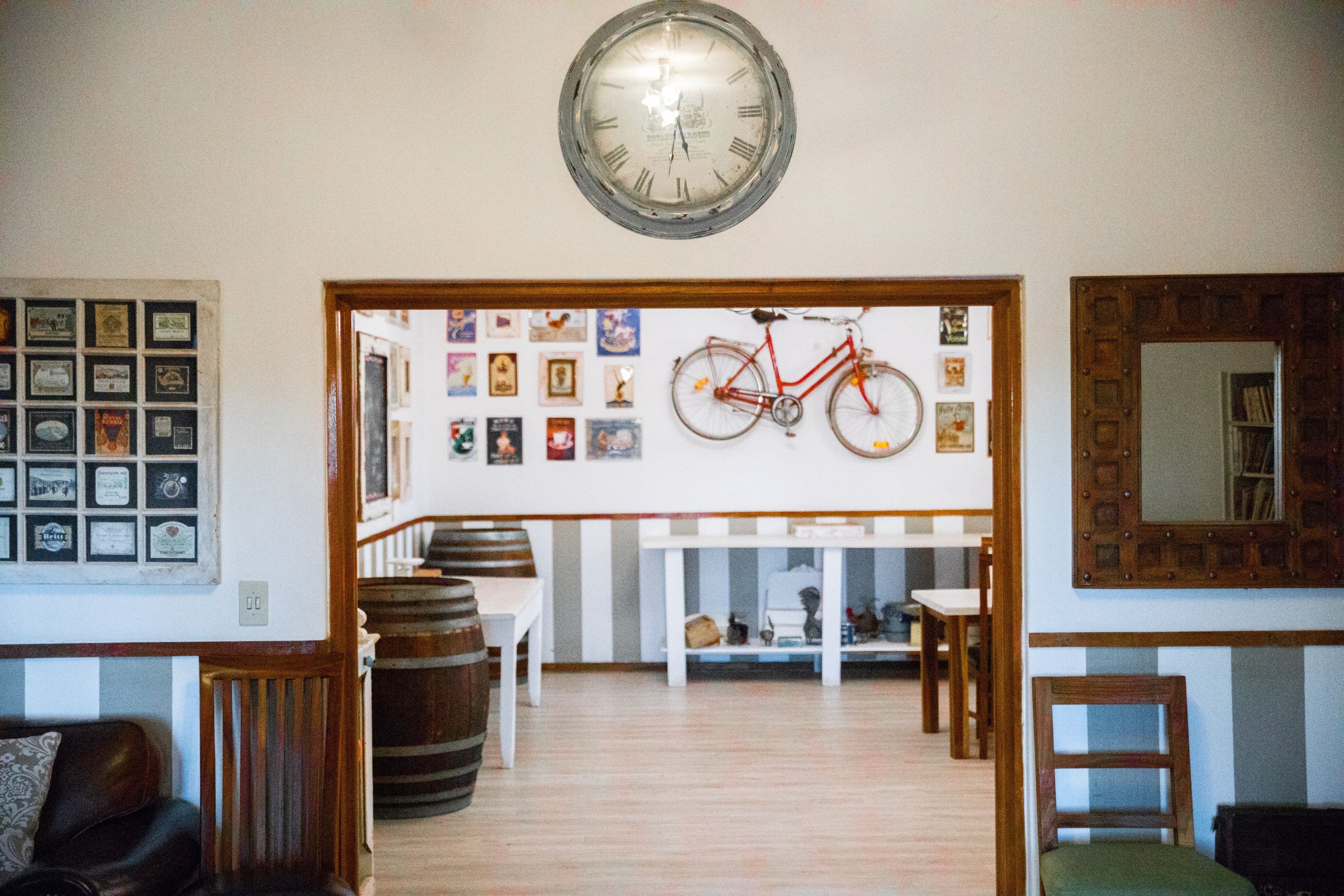Lodge main area, antiques, treasures from time gone by and collector’s items, Kalahari Farmhouse, Namibia