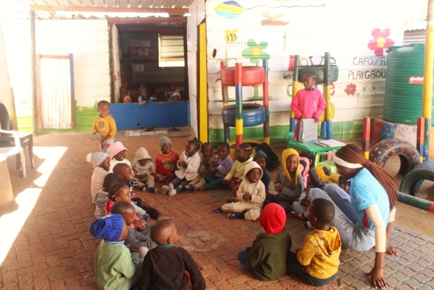 Gondwana Care Trust visit to Etuhole Primary School in Havana, Windhoek 2025_ Lerners sitting down without infrastructure