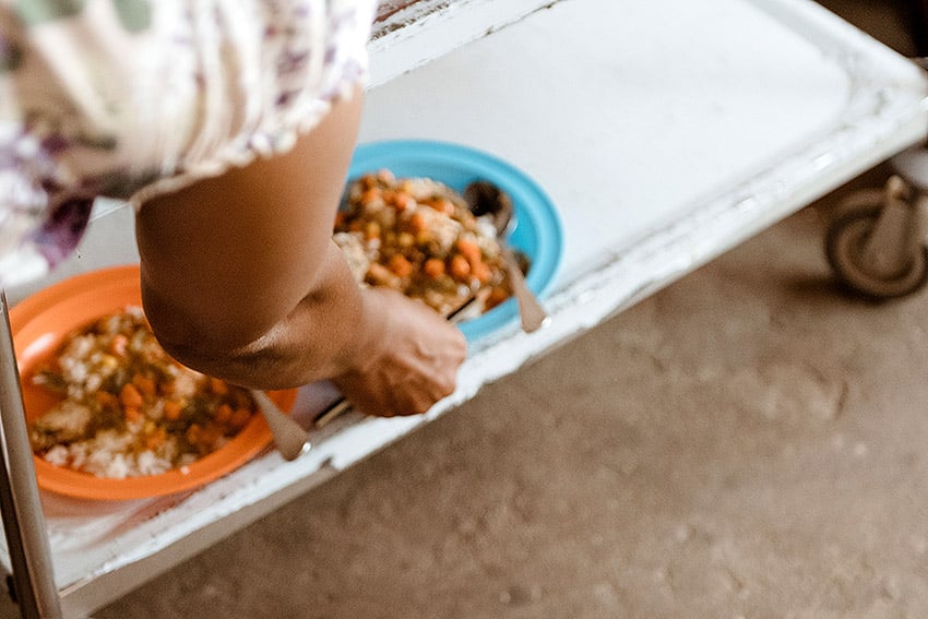 Handing out plates with food