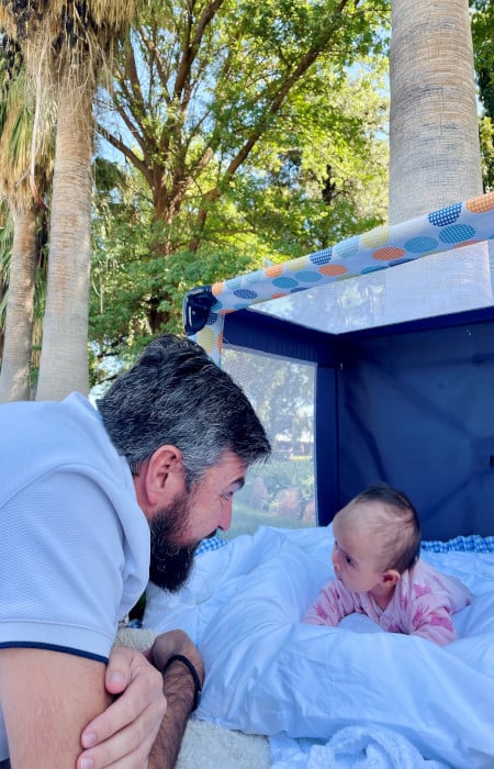 Lizy doing tummy time with daddy