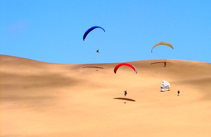 Paragliding in dunes, Namibia