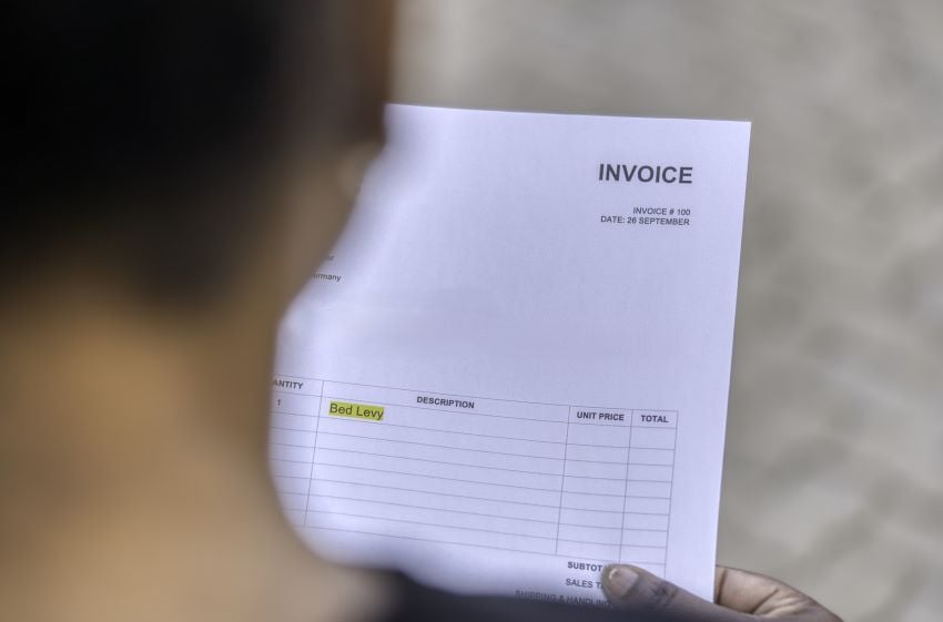 Person looking at document. 