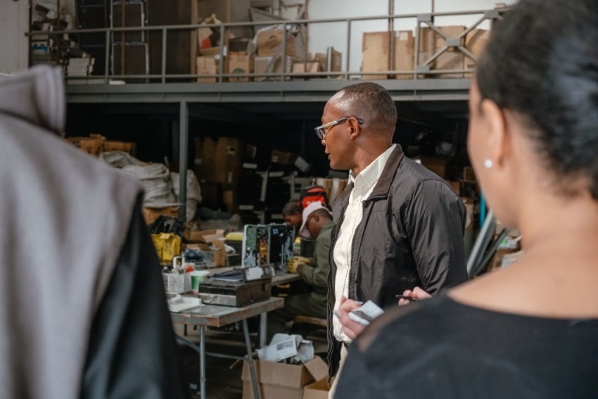 Owner explaining the process of e-waste