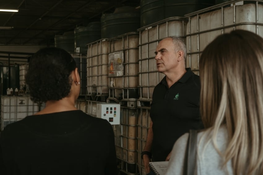 Owner of BEE Biofuel explaining the process of used cooking cooking oil