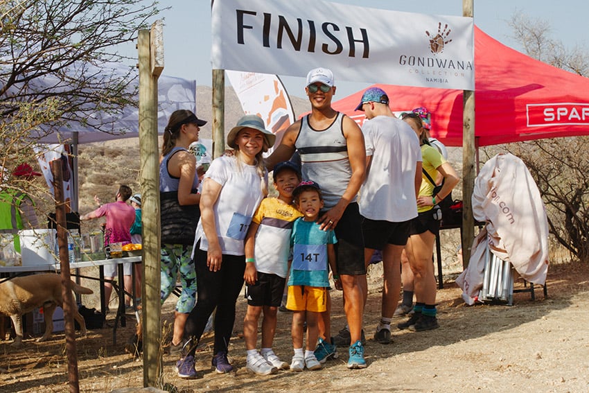 Family at the finish line after a trail run, Namibia