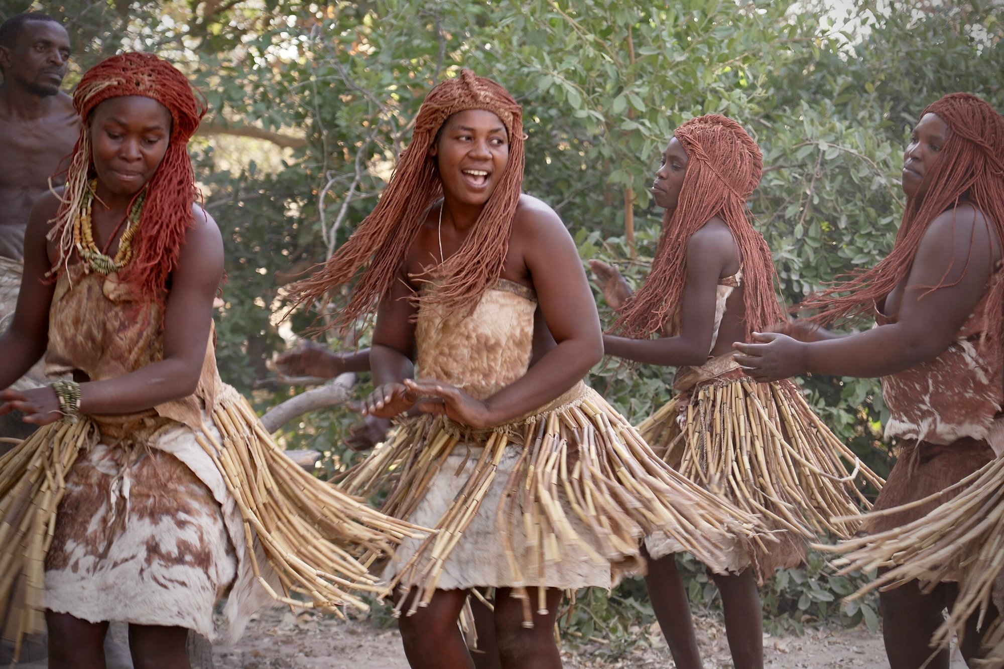 Dancing women in traditional attire, Mbunza Village, Kavango, Namibia