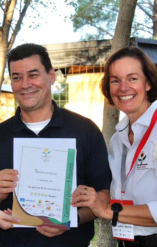 Two persons with Eco Award certificate, Namibia