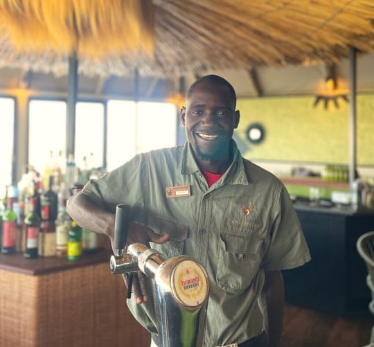 Herbert behind the bar at Gondwana Collection Namibia's Chobe River Camp