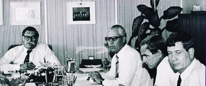 Andries Pretorius (left) chairing a meeting.