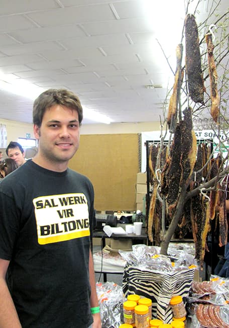 Christian is happy to be paid with biltong for his work at the Biltong Festival (“sal werk vir biltong”).