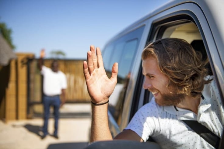 Waving Tourist