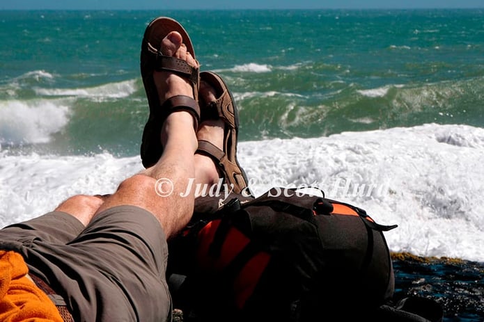 feet up by the sea