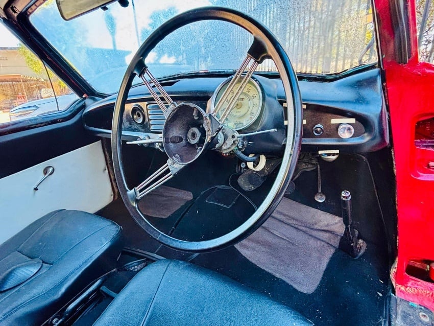 Interior of the 1957 Nash Metropolitan Series III Hardtop, soon to arrive at Gondwana Collection Namibia’s Canyon Roadhouse, featuring its simple vintage dashboard, classic steering wheel, chrome accents, and nostalgic mid-century design details.