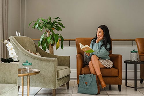 Woman reading at a Gondwana lodge