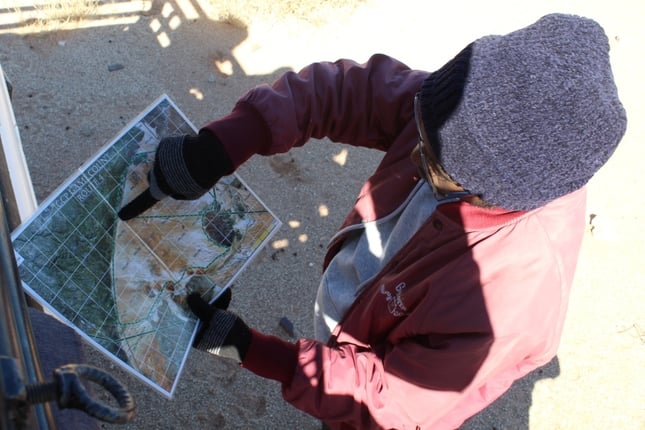 Game count participant studies the Monad grid map