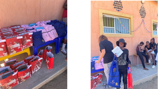 Children receiving their bags