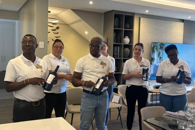 Participants during a wine handling session. 