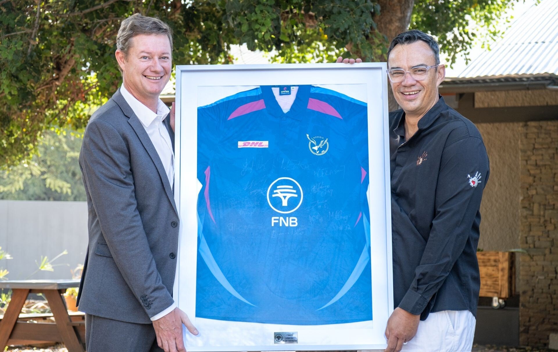 Gondwana Collection CEO Gys Jobert receives FNB eagles signed cricket jersey  