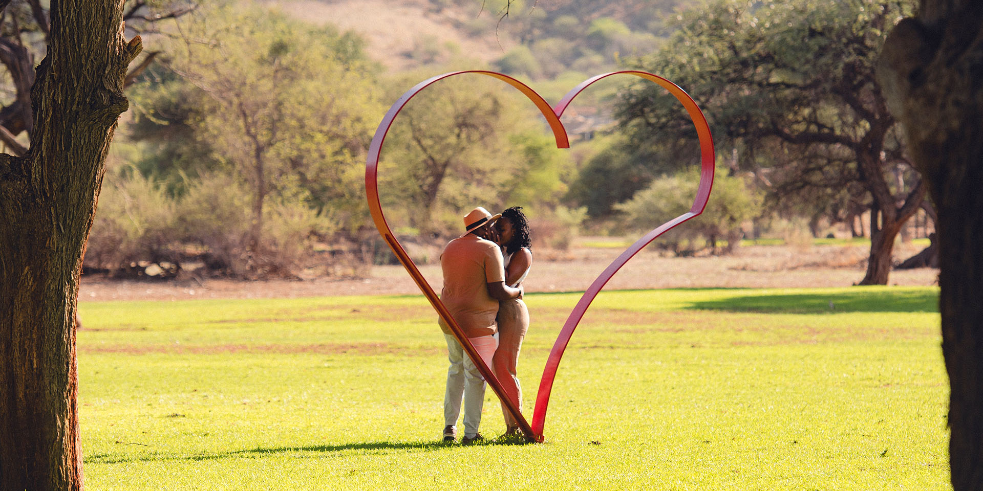 Couple kissing in a heart frame, Namibia