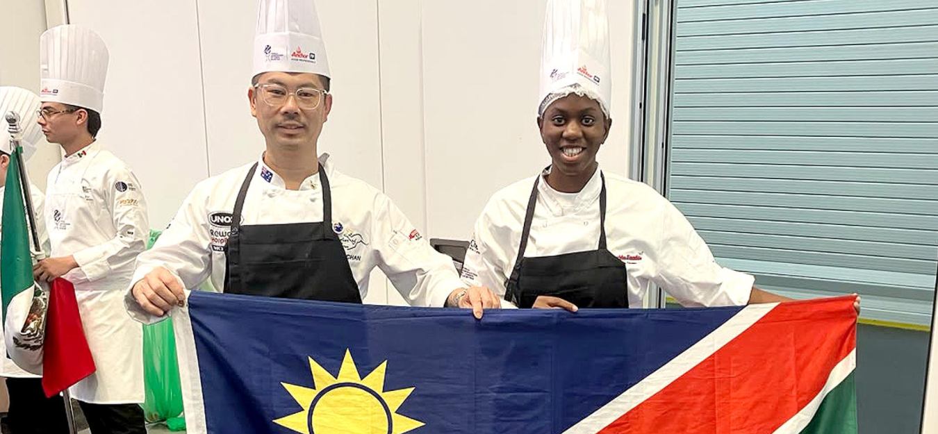 Namibische Köche mit Flagge bei Chefkoch-WM, Wales