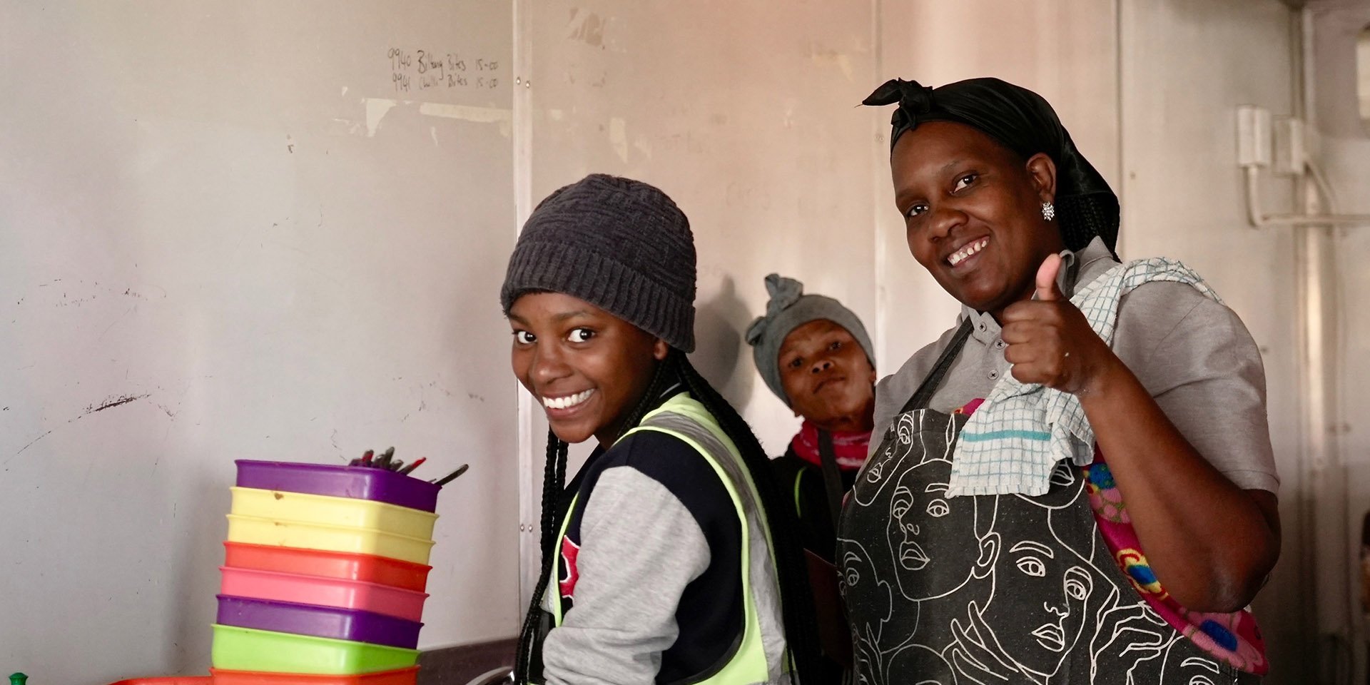 3 Namibian women washing dishes, Namibia