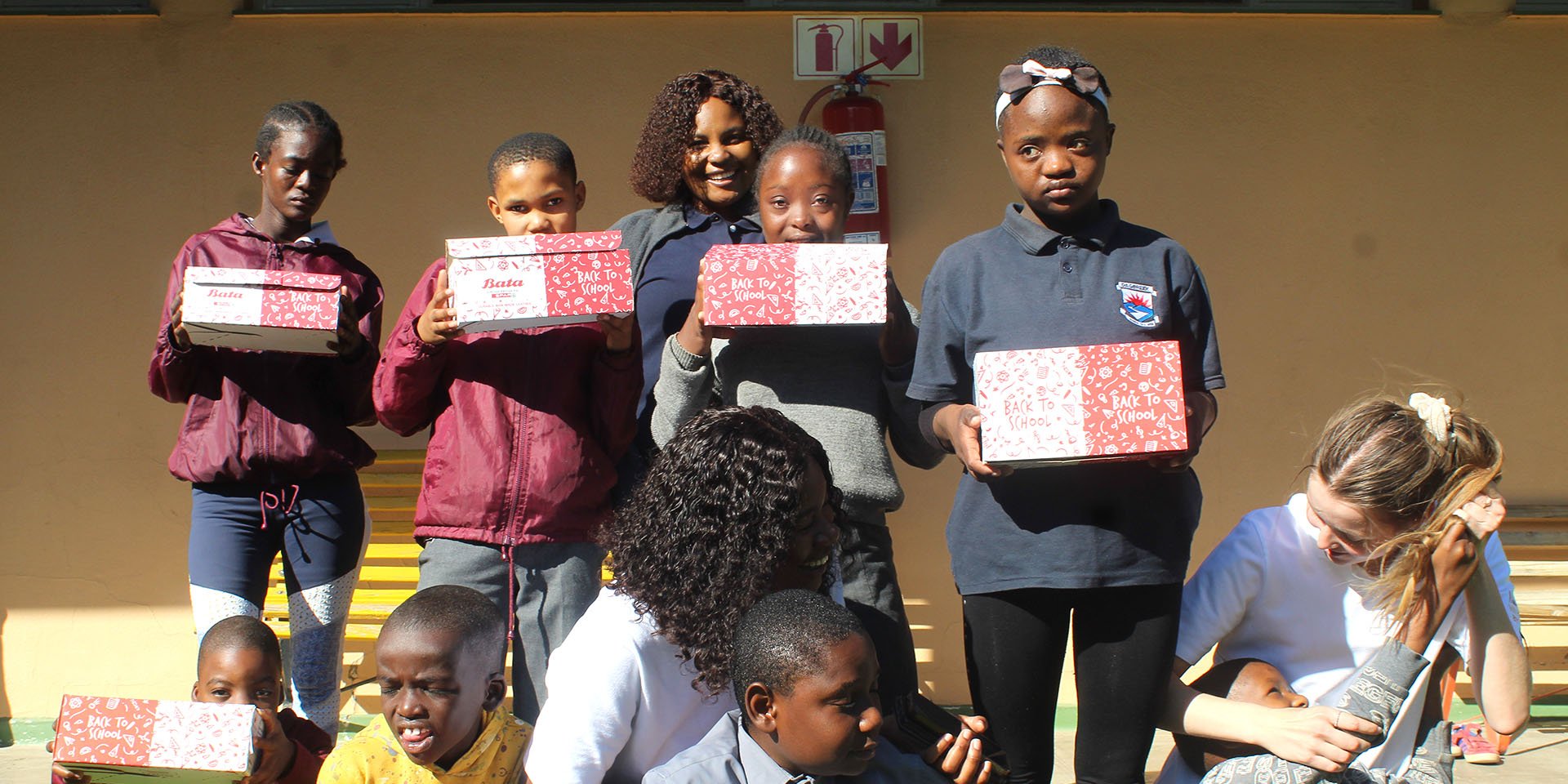 Namibian children holding gifts