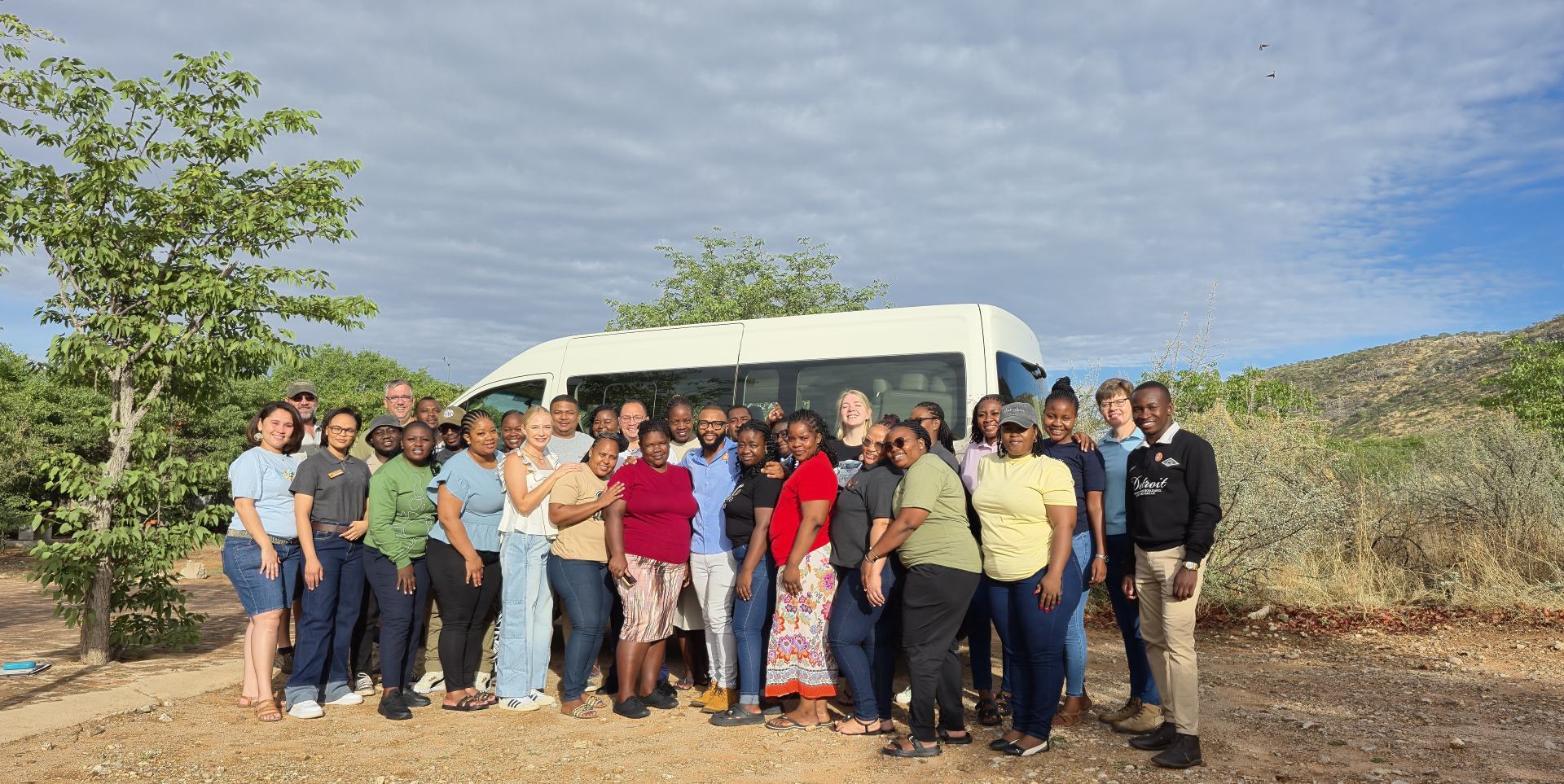 Gondwana employees participating in hands-on system training sessions, collaborating with colleagues, and celebrating achievements as Systems Champions at Damara Mopane Lodge