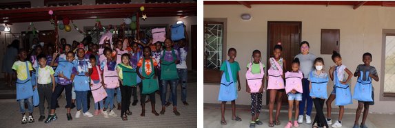 children receiving their bags