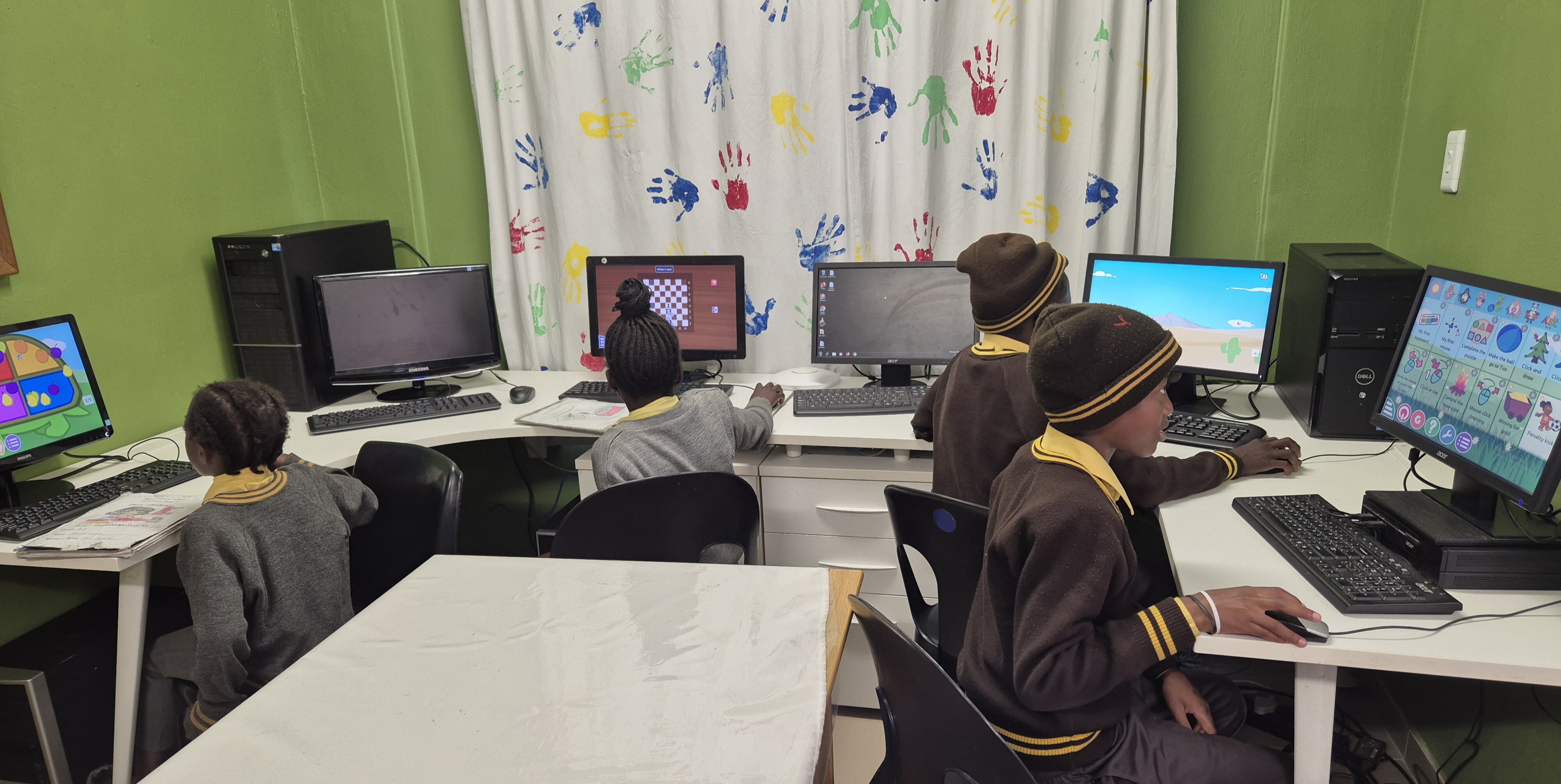 Learners at The Promiseland Trust use computers donated by Gondwana Care Trust 