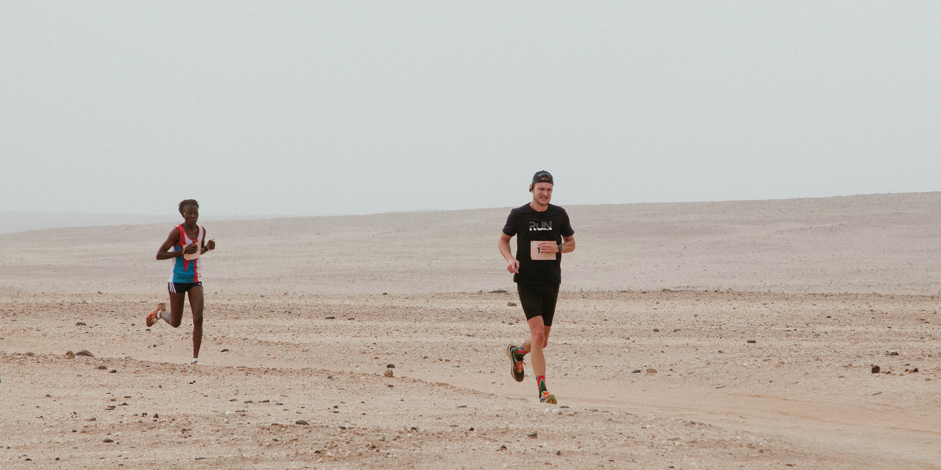Trail runners in the Namib Desert