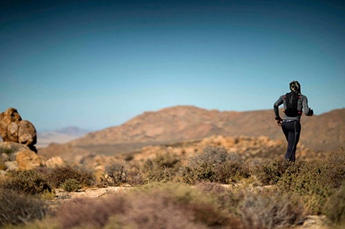 Runner in the African bush, Namibia