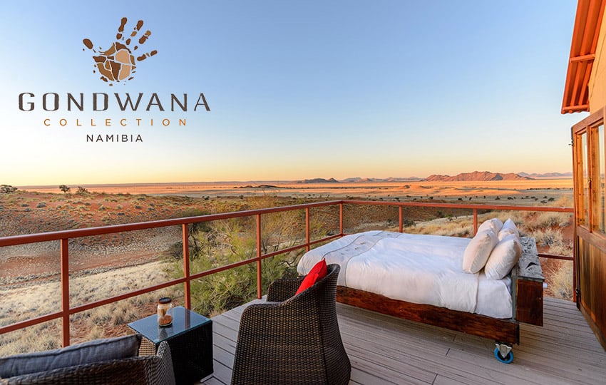 Lodge bed on balcony, Namib desert view, Namibia