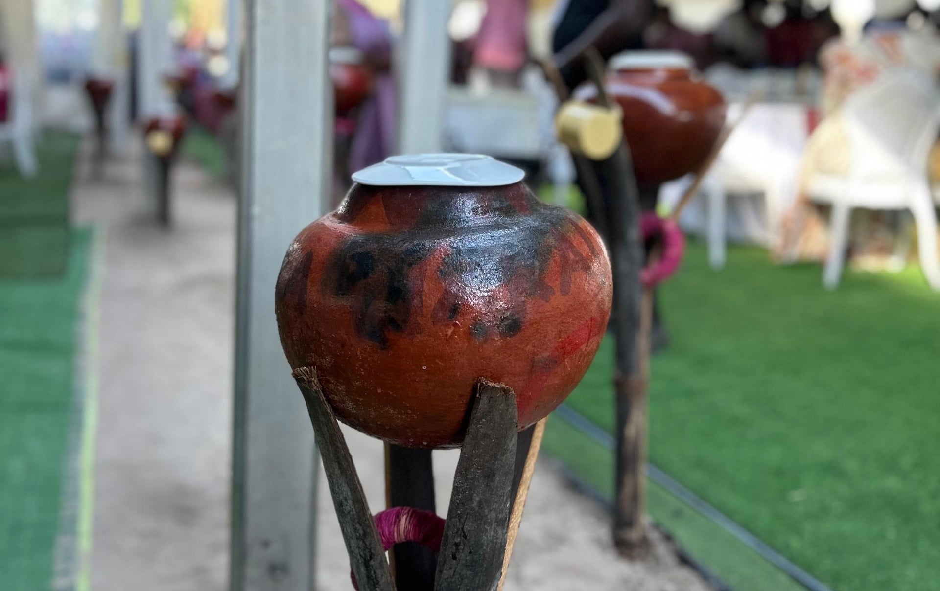 Marula juice (omagongo) is served in traditional clay pots at namibias amarula festival 2026