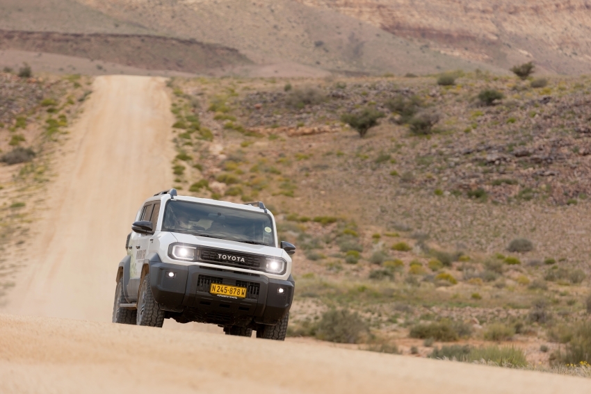 Vehicle on gravel road, Namibia2Go car rental's Toyota Land Cruiser FJ on Namibia's road